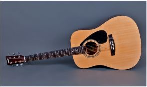 Yamaha FDQI Six String Acoustic Guitar. High quality with a high gloss protective finish to