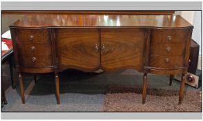 Reproduction Mahogany Sheraton Style Sideboard, turned legs. 86 inches wide and 33 inches high.