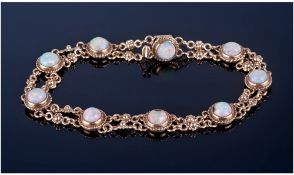 9ct Gold Opal Set Bracelet, Set With 10 Polished White Opals, With Chain Links, Fully Hallmarked.