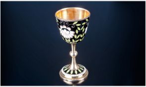 A Russian Silver Gilt and Enamel Vodka Cup. Pedestal Knopped Stem on a Spreading Foot. The Outer