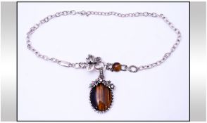 Tiger Eye Butterfly and Flower Asymmetric Pendant Necklace. The oval tiger eye pendant decorated
