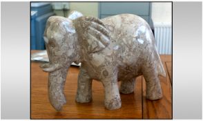 Heavy Marble Figure Of An Elephant. Light grey/cream colour way. Height 9 inches, width 12.5