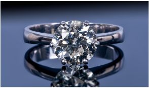 18ct Gold Set Single Stone Diamond Ring. The round brilliant cut diamond of good colour, but white