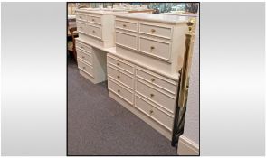 Pair Of Contemporary Bedside Units with 4 drawer configuration, painted cream 337 by 18 inches deep,