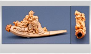 A Fine Quality Meerschaum Pipe Decorated with a Couple with a Child Leaning on a Cannon In Distress.