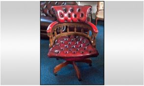 Red Leather Button Backed Chair, Office/Desk Swivel Chair, Raised On Castors.