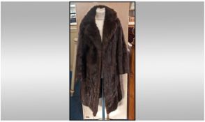 Ladies Dark Brown Mink Coat, fully lined, Slit pockets.