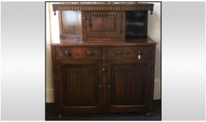 Charles I Style Court Cupboard of typical form with carved and moulded edges. Base with two