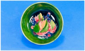Moorcroft Footed Bowl, Leaves and Berries on Blue - Green Ground. c.1940's. Height 2.75 Inches, 5.25