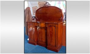 Victorian Mahogany Shaped Fronted Buffet with moulded scroll back. Central frieze drawer and