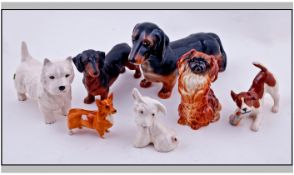 Beswick Dog Figures, 7 In Total. Comprises; 1, Pekinese Begging, model number 1059, height 4.25
