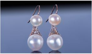 Pair Of Cultured Pearl And Diamond Drop Earrings, Each Set With Two Pearls Between Rose Cut