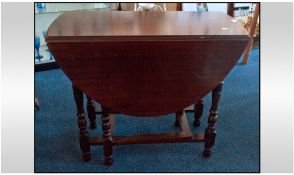Mahogany Drop Leaf Gateleg Table. 29 inches high, 36 inches wide.