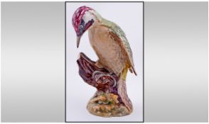 Beswick Bird Figure Woodpecker. No flowers on base. Model number 1218B. Issued 1967-1989. Height 9