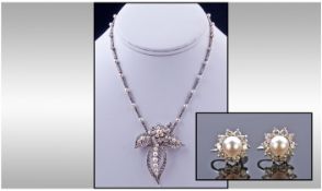18ct White Gold Set Diamond and Pearl Pendant/Brooch. Fitted on a diamond and pearl matching