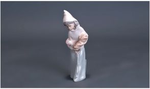 Lladro Figure, of a girl holding a hen. 8 inches in height.