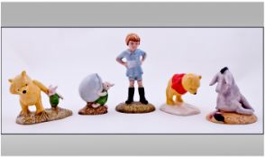 A Collection Of Royal Doulton Figures, 5 In Total. 1, Winnie The Pooh and the paw mark WP3. 2,