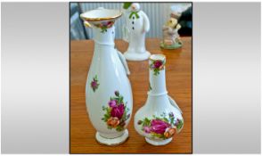 Two Royal Albert Fine Bone China "Old Country Roses" Vases. Floral decoration on white ground,
