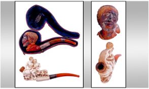 Vienna Made Very Fine Meerschaum Pipes, with intricately carved bowls. Silver plated and amber mouth