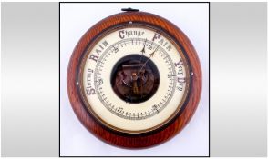 Early Twentieth Century Oak Carved Aneroid Barometer. 10 inches in diameter.