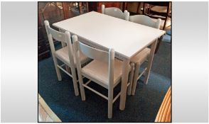 1950's Style Rectangular Kitchen Table and Four Grey Painted Chairs. Table top 26 by 42 inches.