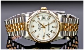 Rolex 18ct Gold And Steel Oyster Perpetual Date Just Gents Wrist Watch. The white dial with