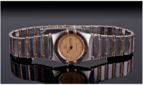 Omega Constellation Brushed Gold And Steel Ladies Wrist Watch. Number 6104/465. Complete with box.