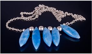 Silver Necklace Set With Five Faceted Blue Coloured Hardstones.