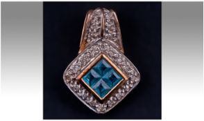 9ct Gold Diamond And Blue Topaz Pendant Drop. Marked 9 375. Height 0.75 inches.