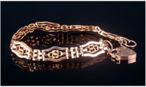 Ladies Early 20thC 9ct Rose Gold Gate Bracelet, with safety chain and Padlock. Date 1921. Length 8