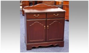 Rossmore Fine Modern Furniture. Top Quality Polished Mahogany Cabinet Chest, with two small drawers.