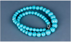 A Turquoise Matrix Necklace with White Metal Clasp. The Necklace Consisting of Fifty Five