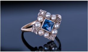 Early 20thC 18ct Gold Dress Ring, Set With A Central Blue Princess Cut Sapphire Surrounded By 8 Seed