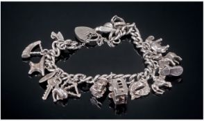 Vintage Silver Curb Bracelet, Loaded with 15 Charms. All Marked Silver or 925. 4.9 grams.