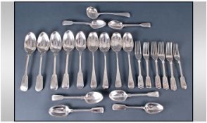 A Collection of Victorian and Edwardian Silver Flatware comprising 16 Tablespoons and 6 Forks.