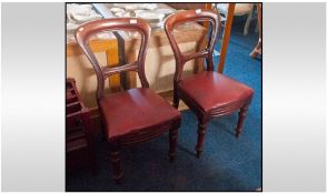 Pair Of Mahogany Victorian Balloon Back Chairs. With red leatherette drop in seats on turned legs.