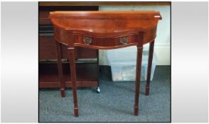 A Reproduction Georgian Style Walnut Shaped Top Side Table of small proportions. On reeded tapering