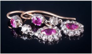 A Very Fine Vintage Pair Of Natural Ruby And Diamond Earrings. The pear shaped natural Burmese