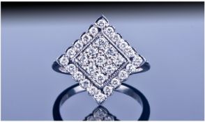 18ct White Gold Diamond Cluster Ring. Square setting, mounted with round brilliant cut diamonds.