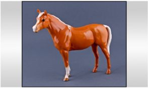 Beswick Horse Figure, Arab ``Bahram.`` Model number 1771. Palomino gloss. Issued 1961-1989. Height