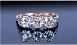 18ct Gold And Platinum Set 3 Stone Diamond Ring With Diamond Shoulders. The old cut diamonds of