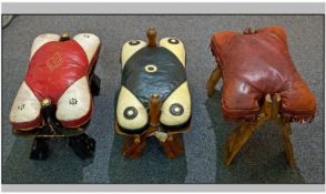 Three North African Original Leather Cushioned Camel Stools.