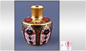 Royal Crown Derby Imari Bud Vase. Pattern number 1128 Date 1982. Height 4.25 inches. First quality