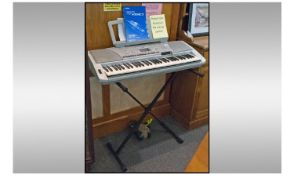 Yamaha Portatone PSR-450 Electric Keyboard. With the instruction manual. On stand. 37 inches in