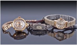 Three Ladies Wristwatches, Comprising A Base Metal Manual Wind Omega, 1930`s 9ct Gold Manual Wind,