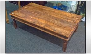 A Teak Low Coffee Type Table Indian style on turned baluster legs. 53`` in width, 31`` in depth &