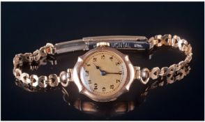 Ladies 1920`s 9ct Gold Cased Mechanical Wrist Watch, fitted on a gold plated bracelet.