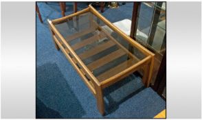G Plan Style Teak Coffee Table with Glass Top and Slatted Shelve Below. 39 x 15 Inches.