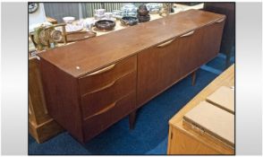 A Teak McIntosh 1960`s Side Board Of Contemporary Design. Two draws to one side and three cupboards