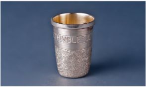 A Thimble Shaped Silver Drinking Tot. The lower half in a bark finish. The upper half sporting the